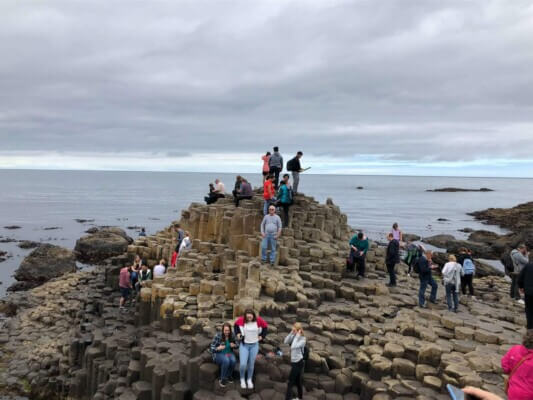 people climbing rocks Antrim: What to See and Do