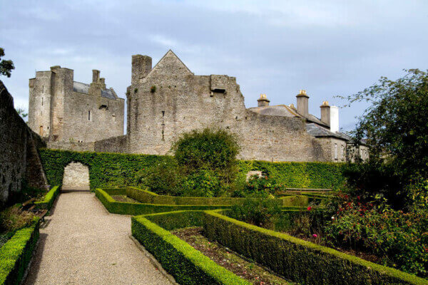 castle with gardens in front 5 heritage towns in Ireland