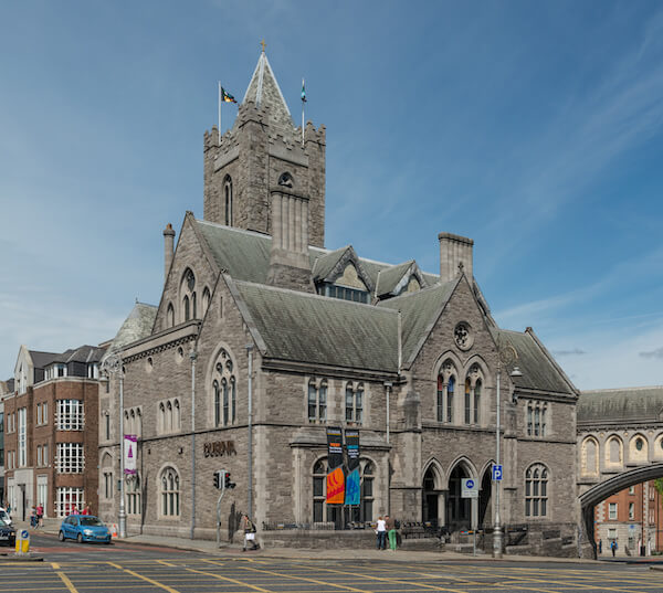 a large grey church building how to save on accommodation in Dublin