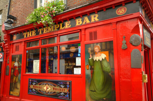 a pub with a red facade October in Ireland