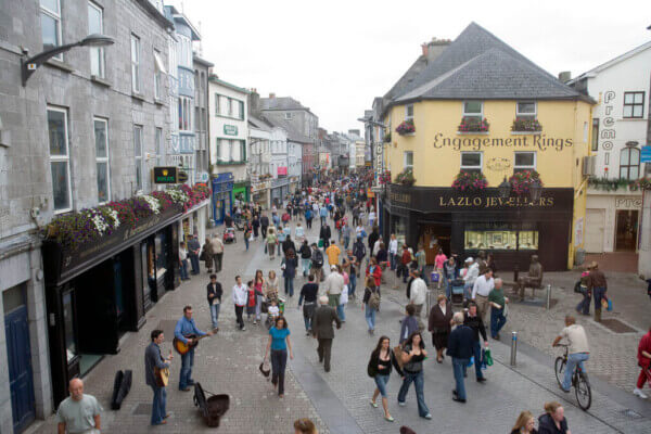 people walking on a street Galway City Walking Tours
