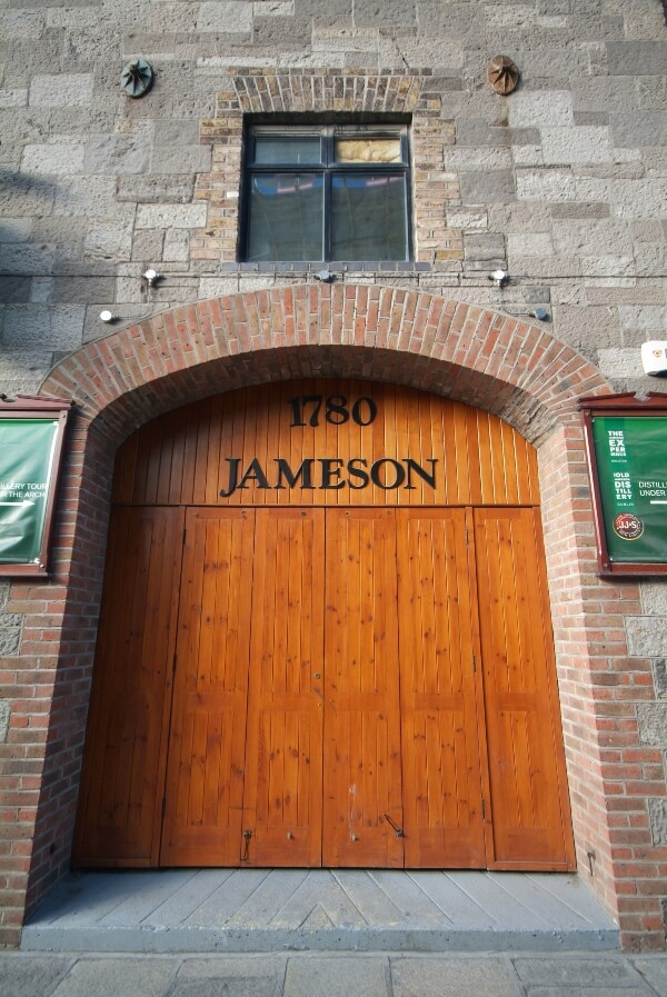 a large brown door Irish whiskey distilleries