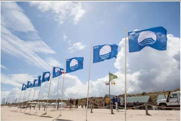 flags on a beach Donegal beaches