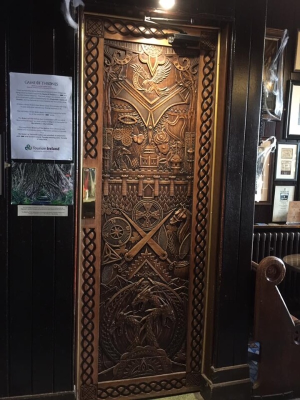 a wooden door Game of Thrones tapestry