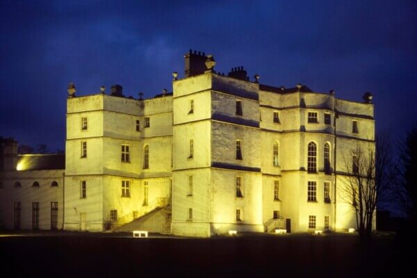 a large building lit up at night Ireland's heritage sites