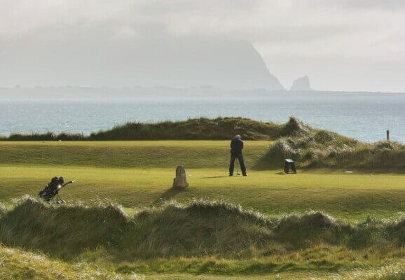 people playing golf glamping in Ireland