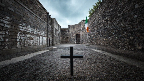 a cross in a courtyard dark tourism destinations in Ireland