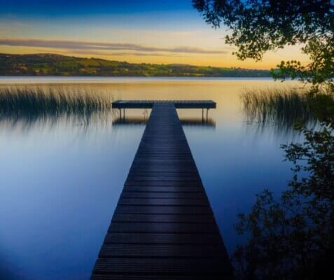 a boardwalk on a lake County Clare