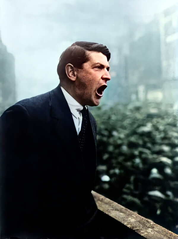 a man shouting at a crowd of people experience Ireland's past