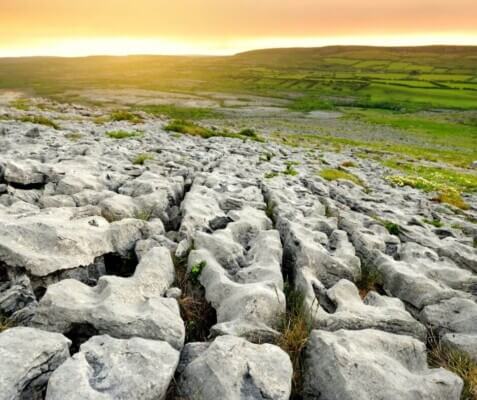 stones near green fields Burren Eco Tourism Network