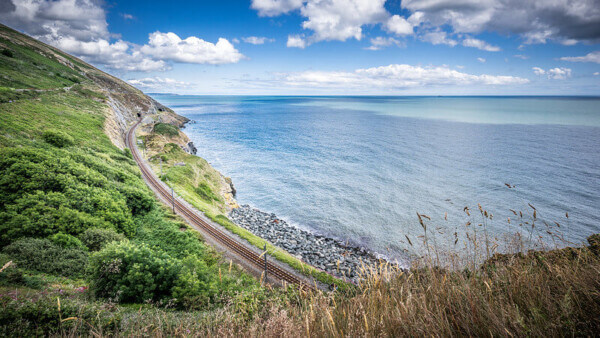 a road along the ocean 5 scenic train rides