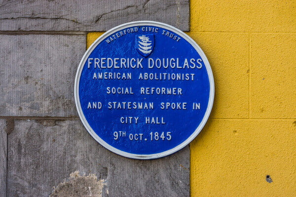 a plaque on the wall Frederick Douglass Way