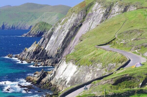 a road and ocean cliffs experience the Great Blasket Island