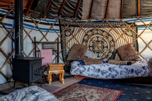 a living room in a tent glamping in Ireland
