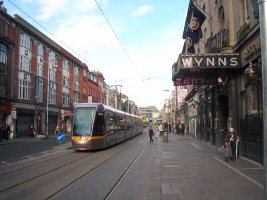 a tram on the street 8 heritage hotels in Ireland