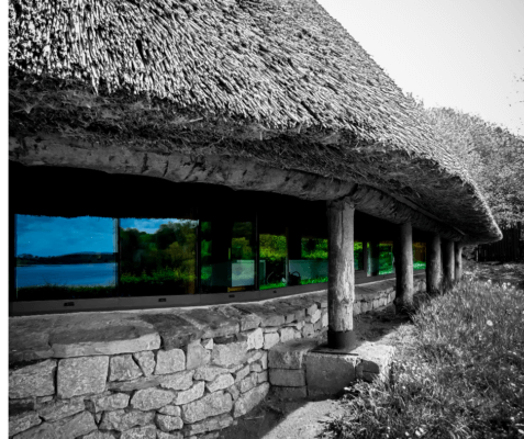 a building with a thatched roof 8 overlooked destinations in Ireland