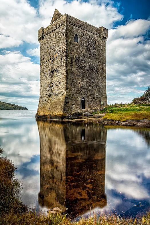 a castle and its reflection in the water 5 inspirational Irish women