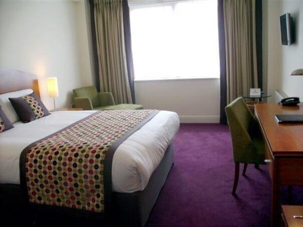 a bedroom in a hotel where to stay in Cork City