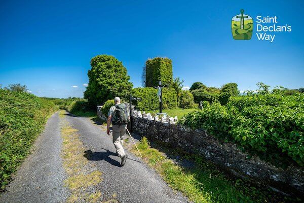 a man walking on a country road 7 new attractions in Ireland