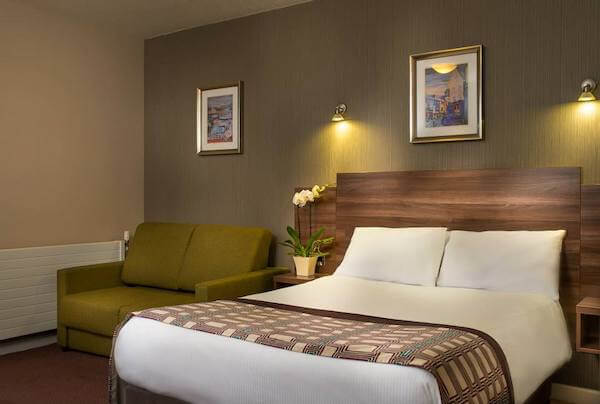 a bed in a room 10 affordable hotel stays in Galway