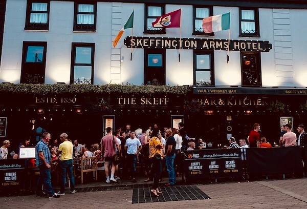 flags flowing outside a building 10 affordable hotel stays in Galway