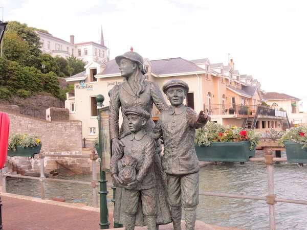 statues of three people in Cobh once known as Queenstown Titanic's last port of call