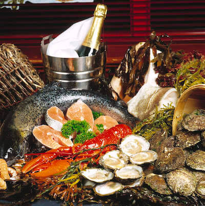 a bottle of champagne and oysters Ireland in September