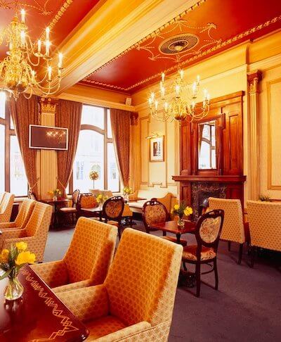 a room with tables and chairs 8 hertage hotels in Ireland