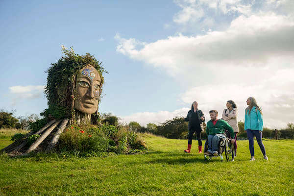 a large face mask in a field Ireland's Midlands
