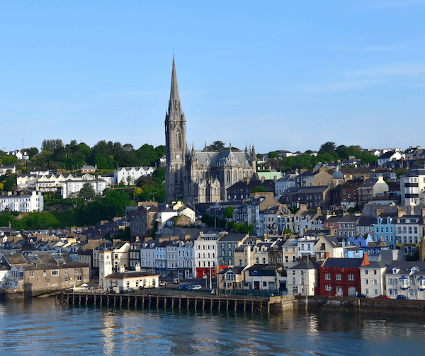 houses and a church near the water 4 Ireland itinerary ideas
