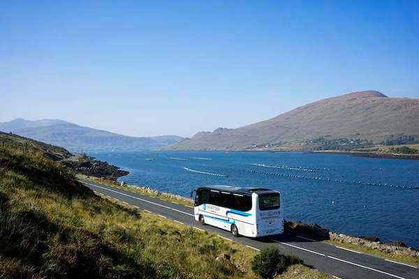a bus on the road affordable day trips from Galway