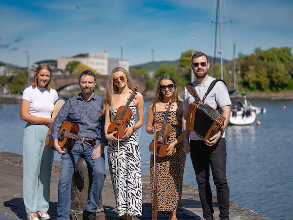 people holding instruments Dungarvan hosts TuneFest